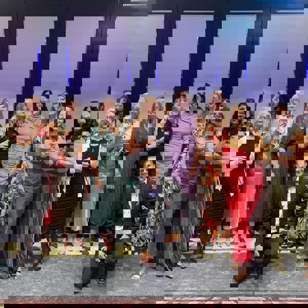 A group of people celebrating 