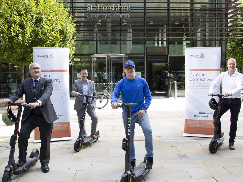 People on e-scooters.