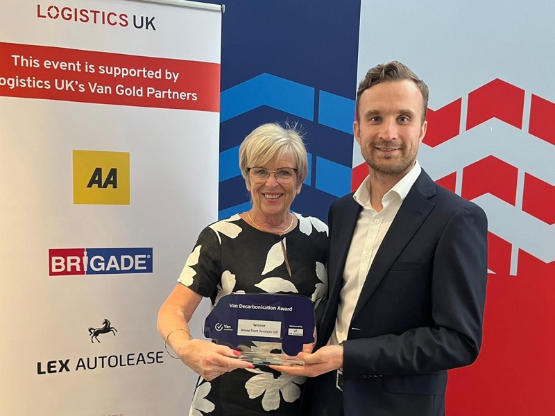Image of Amey employees celebrating their van decarbonation award.