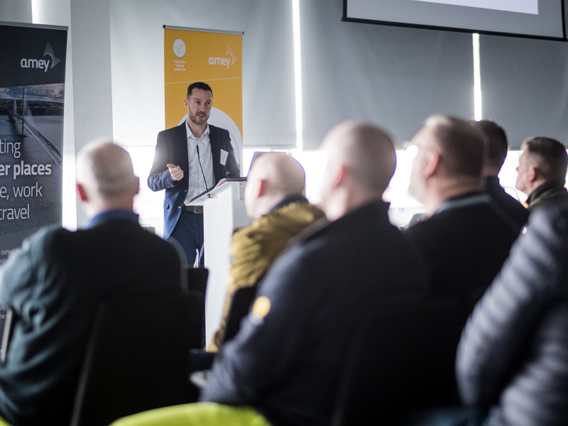 A group of people at a presentation.