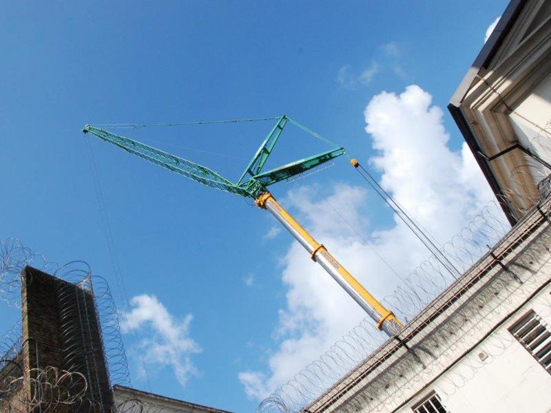 secured area, with barred wire topped fences.