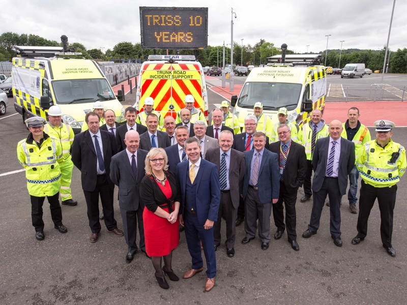 Group shot of Amey celebrating 10 years with TRISS.
