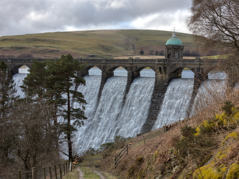 Image of a bridge over a waterfall.