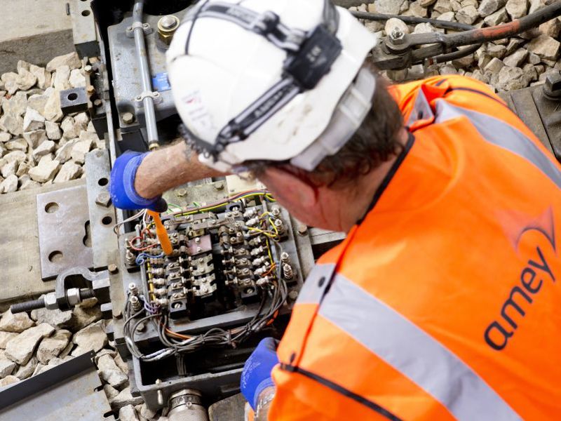 Amey employee carrying out rail maintenance. 