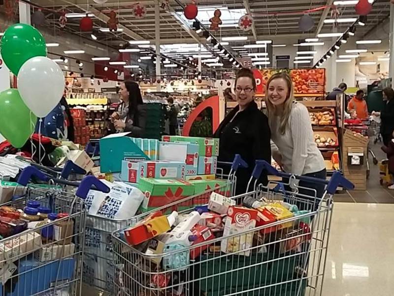 Amey employees, volunteering at a local food bank.