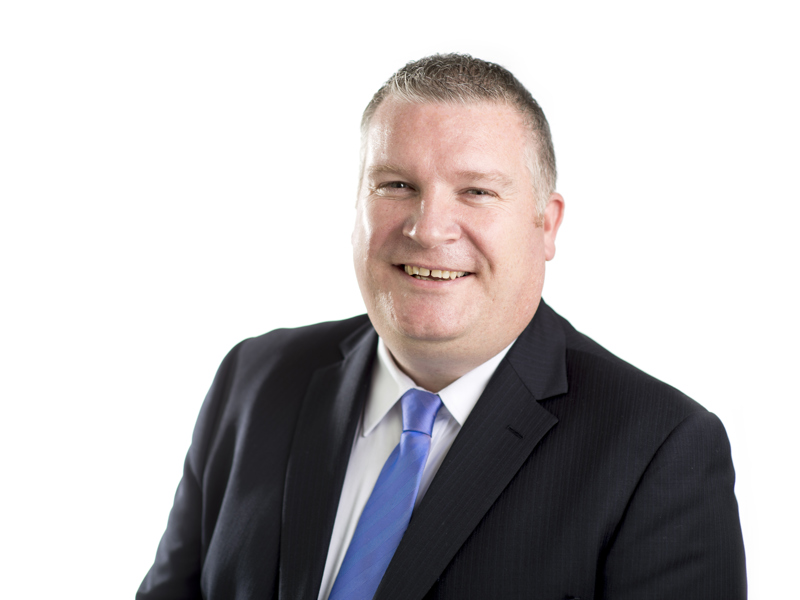 headshot of Joe Docherty.