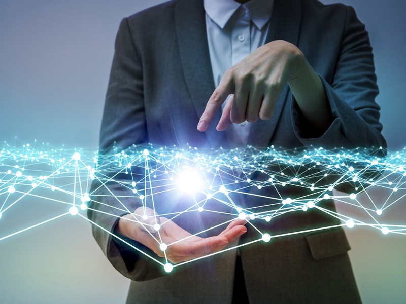 digital image of a man pointing at lines.