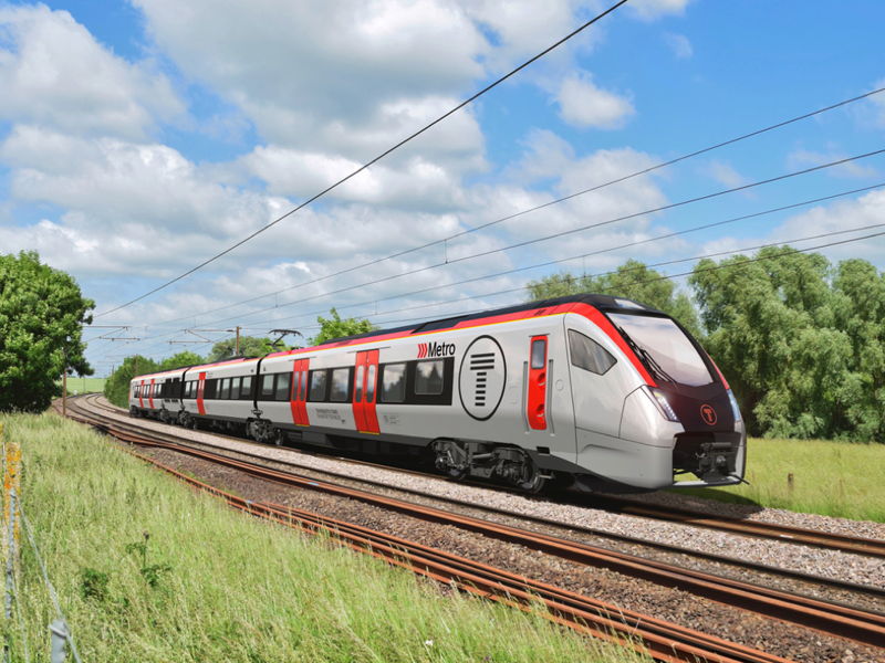 Image of a train going through the country side.