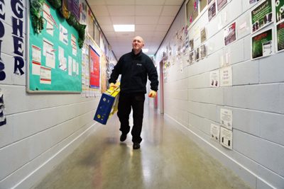 Man carrying a ladder