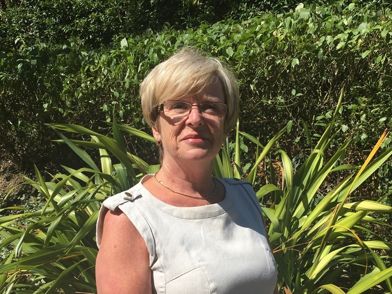 Head shot image of a woman.
