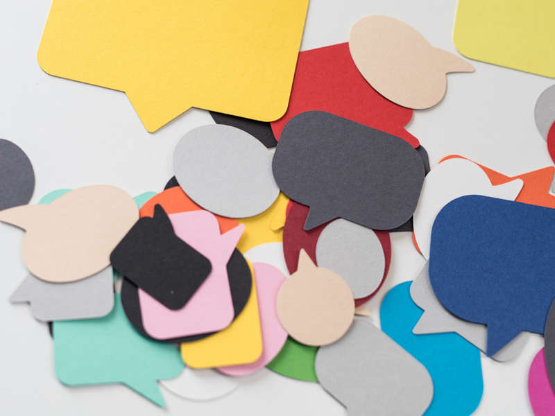 Paper speech bubbles.