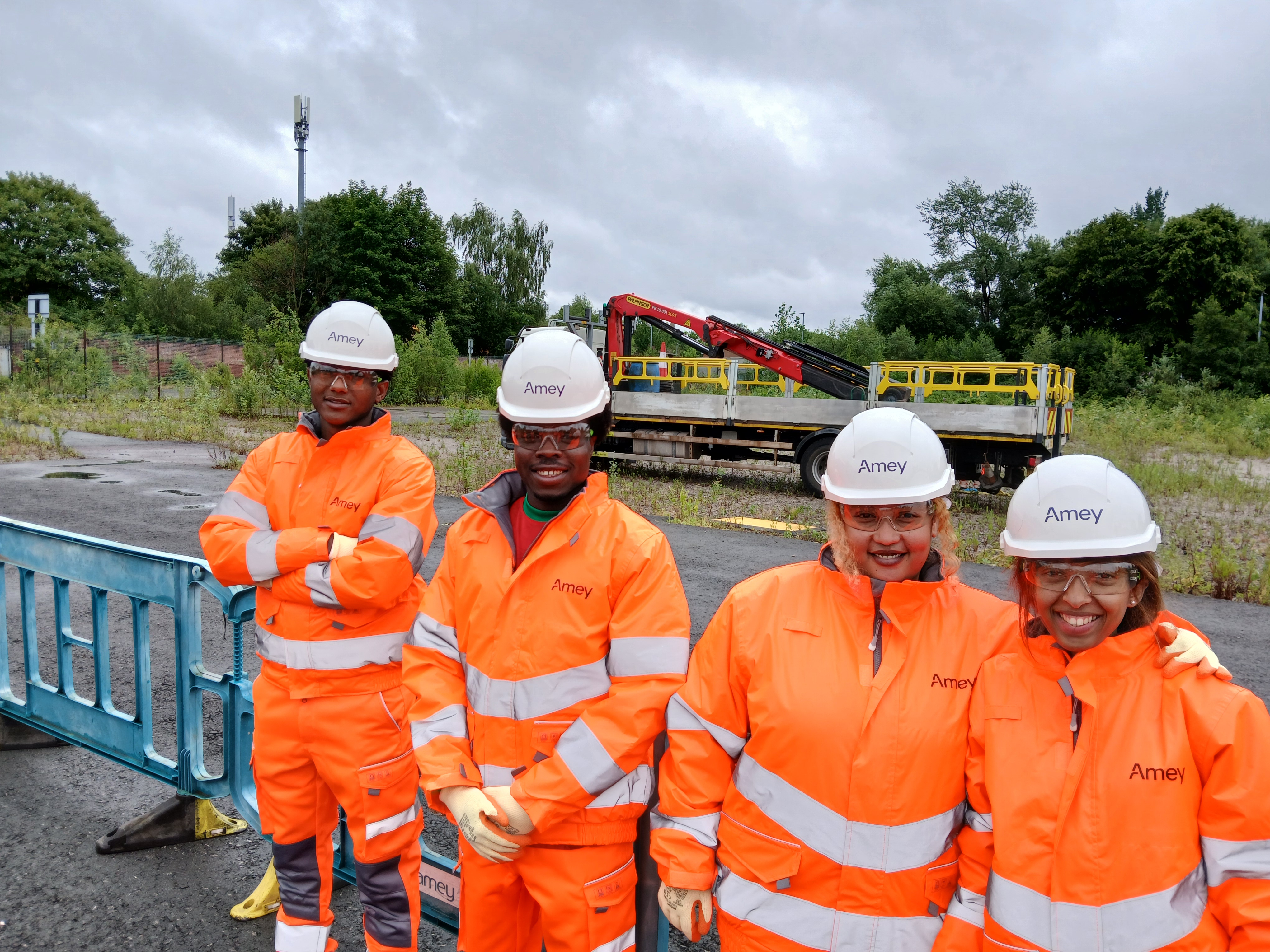 Image of 4 young adults in Amey PPE