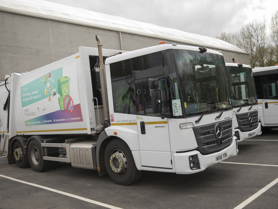 OneTrafford recycling vehicles parked stationary.