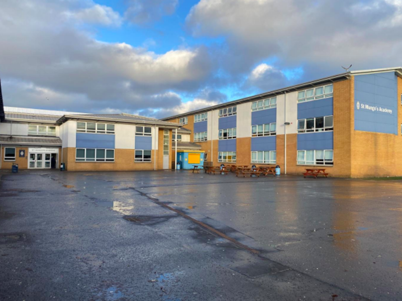 Image of a court yard area in front of an acadamy.