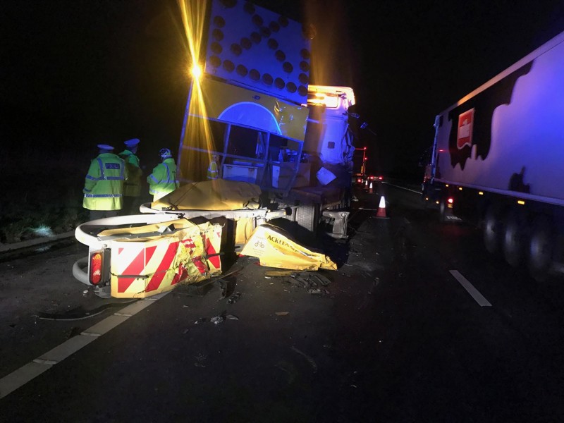 Image of police at a roadside incident.