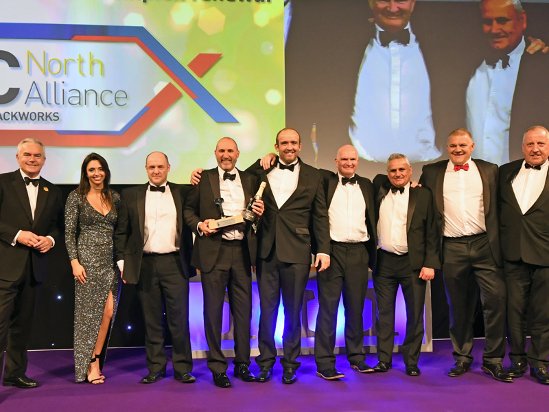 Members of the team receive their award