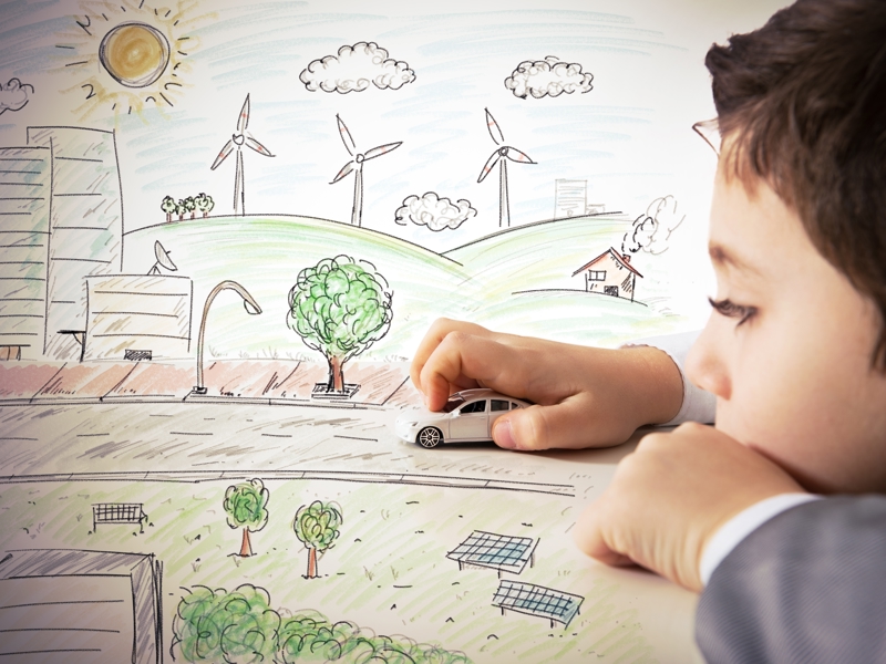 Image of a child playing with a car.