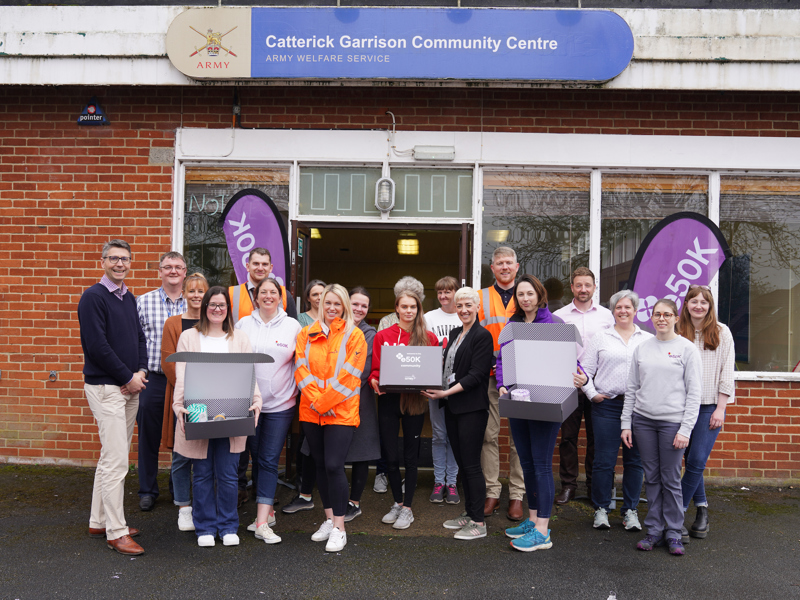 Amey employees stood s=outside Catterick Garrison Community Centre.