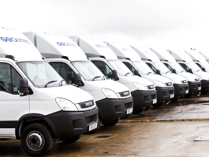 a fleet of Geo Amey vans.